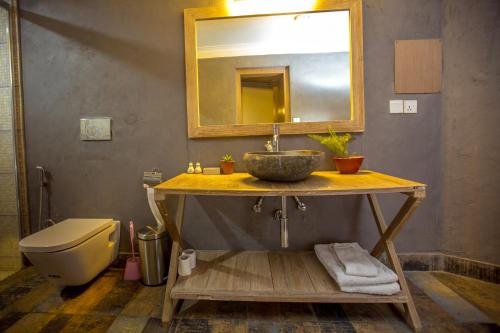 Фото Tangalwood Boutique Hotel