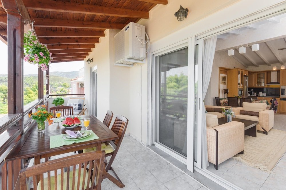 Фото Apartment With 2 Bedrooms in Neos Marmaras, With Wonderful sea View, Enclosed Garden and Wifi Near the Beach