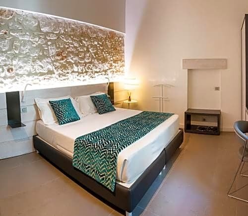 Фото Caportigia Boutique Hotel