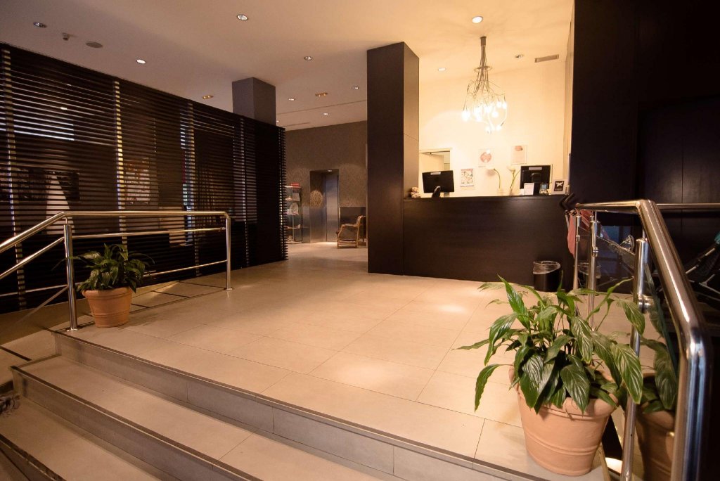 Фото Petit Palace Triball