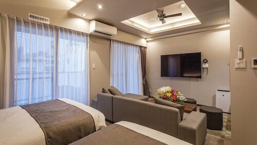 Гостиница Kariyushi Condominium Resort Naha Gsa в Нахе