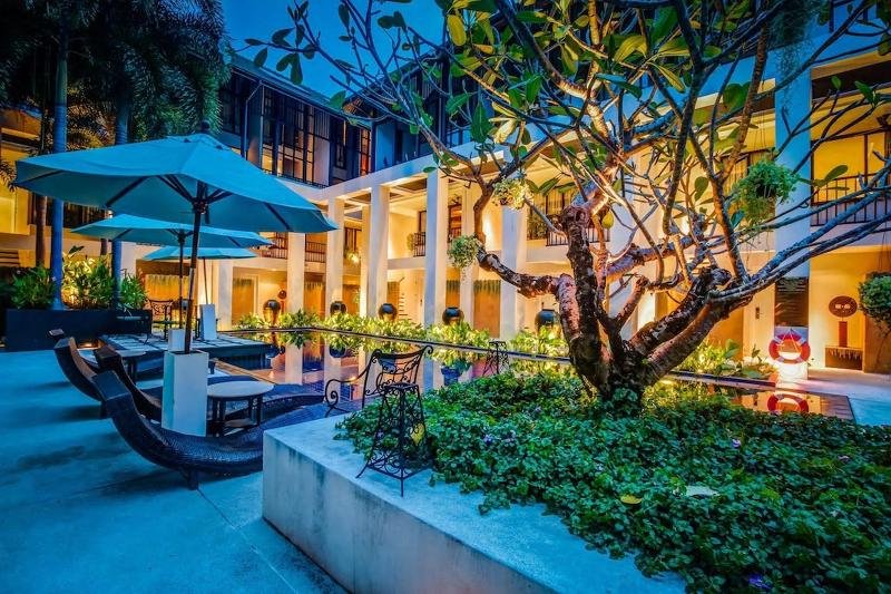 Фото Outrigger Surin Beach Resort