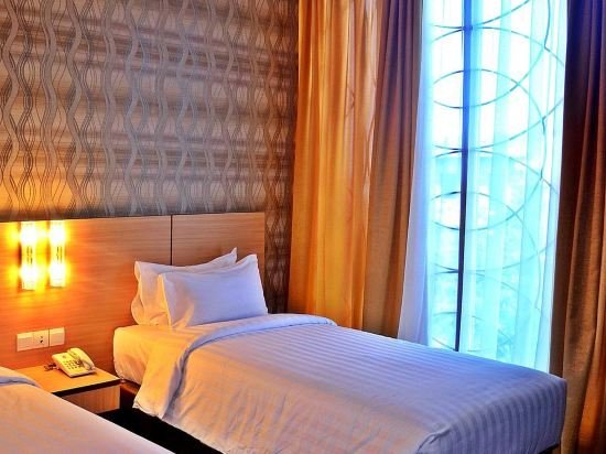 Фото Grand Impression Hotel Medan