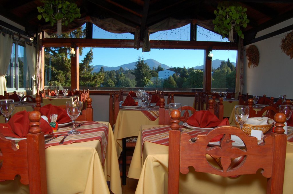 Фото Ruca Cheli Village Ski Hotel