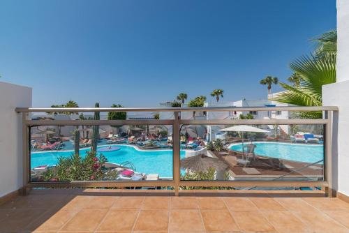 Фото Apartamentos Parque Tropical