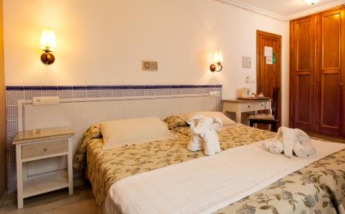 Фото Hostal Boutique Plaza Cantarero