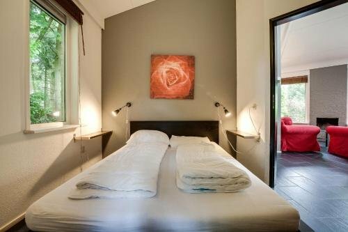 Гостиница Bungalowpark Het Verscholen Dorp в Гелдерланде