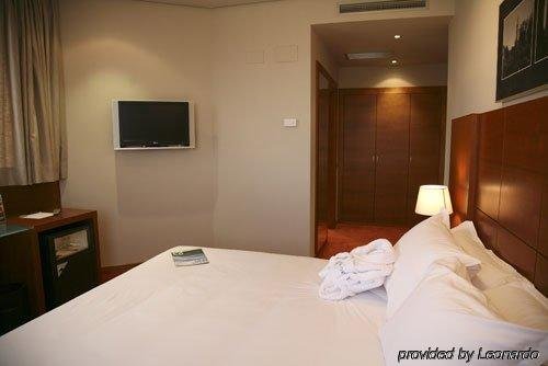 Фото Hotel Silken Ciudad Gijon