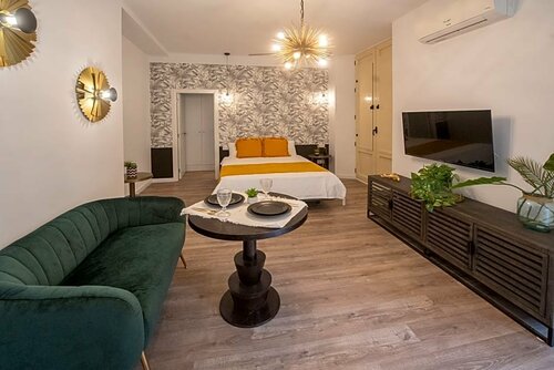 Гостиница Suites La Merced Malaga365 в Малаге