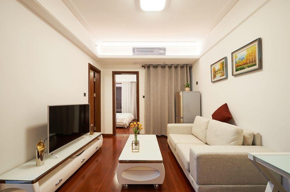 Фото Shen Gang Executive Apartment-Long Hua