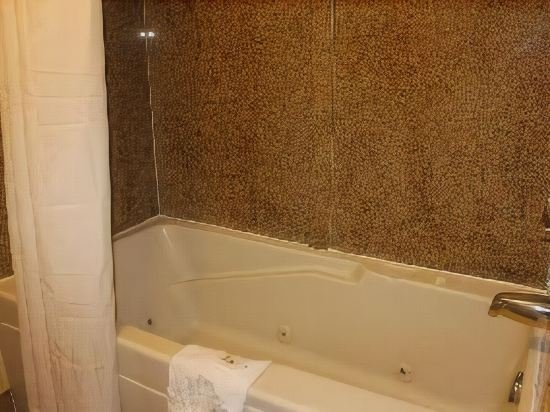 Фото Quarters Inn & Suites