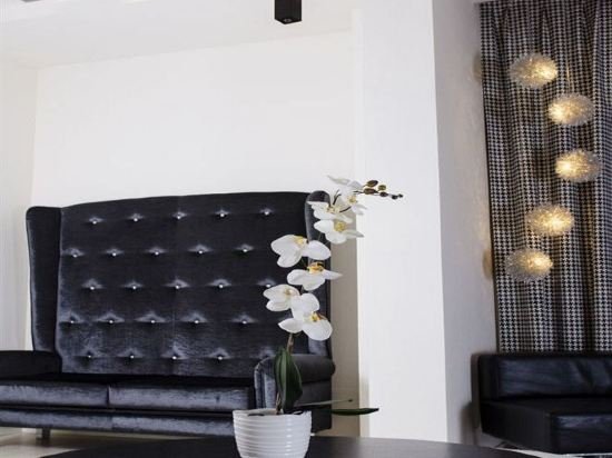 Фото Atmosphere Suite Hotel