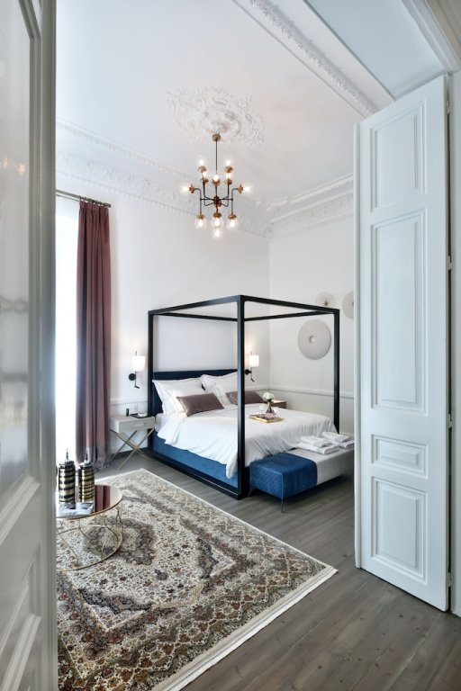 Фото 2 Mazi Suites