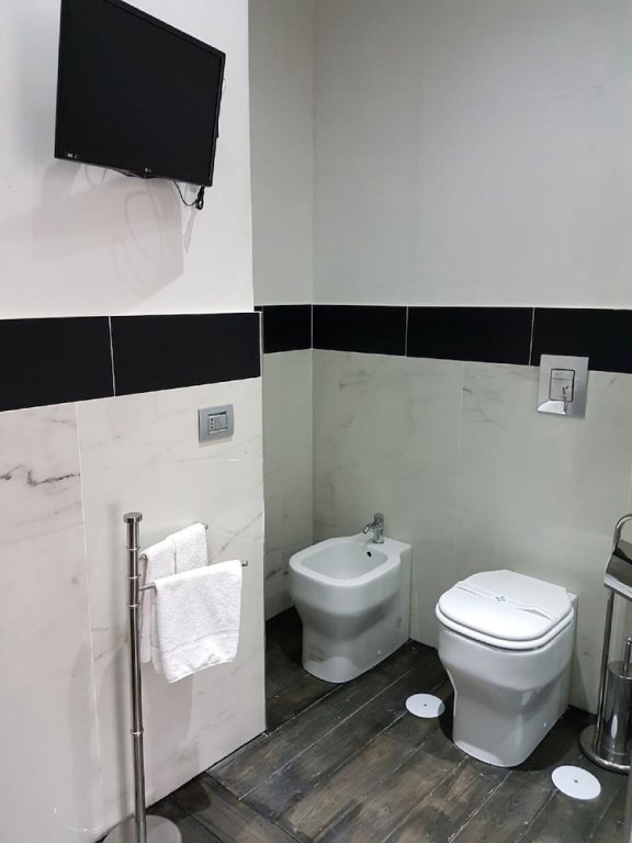 Фото Covo degli Angioini - Town House Suites