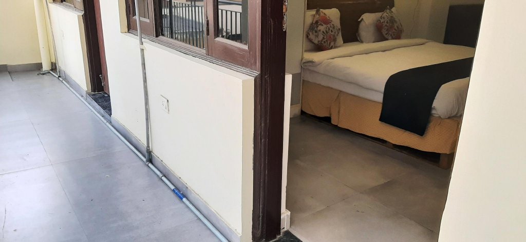 Фото Oyo 28670 Hotel Dev Palace