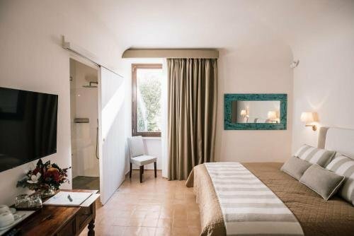 Гостиница Giardini Calce - Luxury Rooms в Равелло