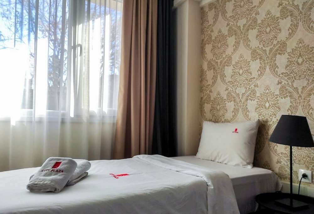 Фото City Plaza Apartments & Rooms