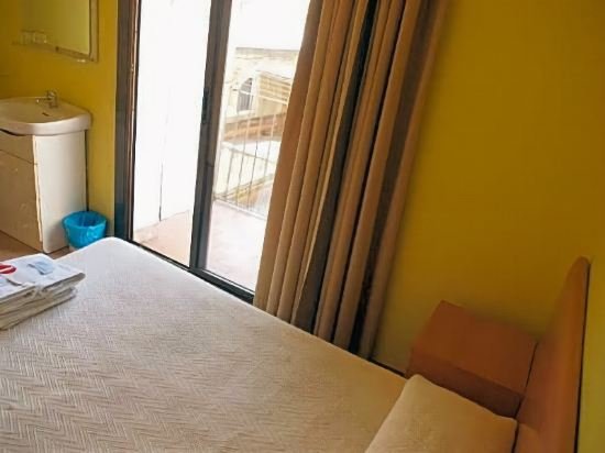 Фото Hostal Delfos