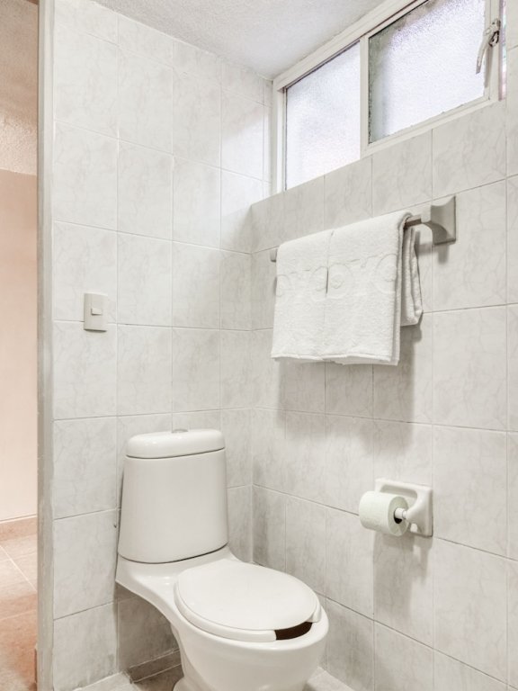 Фото Capital O Hotel La Siesta, Gómez Palacio