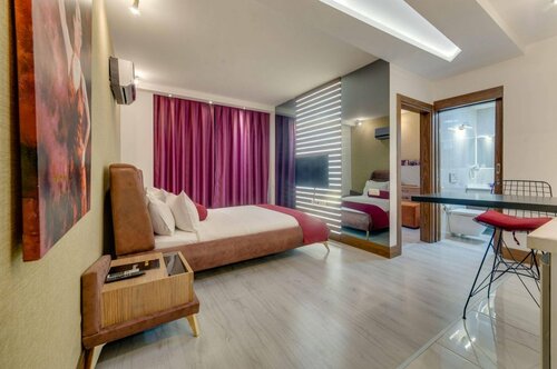 Гостиница Concept Suites в Эфелер