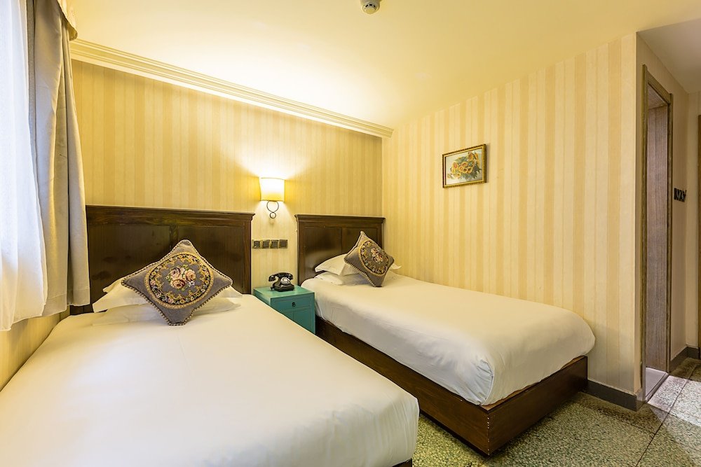 Фото Wuyang Boutique Hotel - Hefang Street