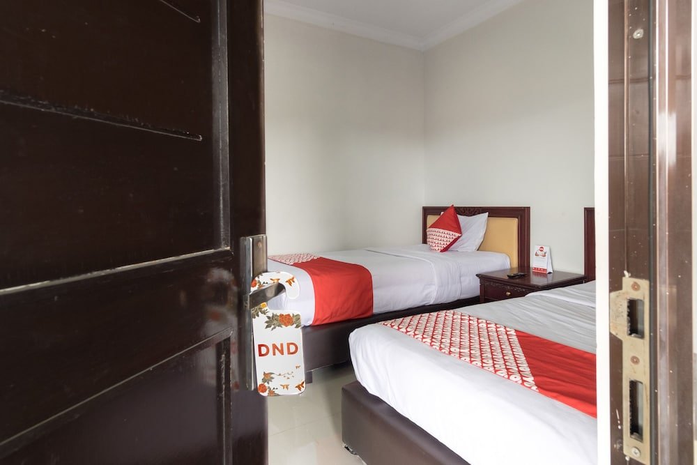 Фото Oyo 283 Helvetia Residence