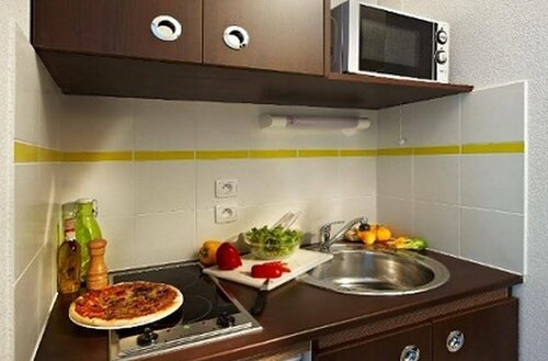 Гостиница Comfort Aparthotel Versailles Saint Cyr Lecole в Трапе