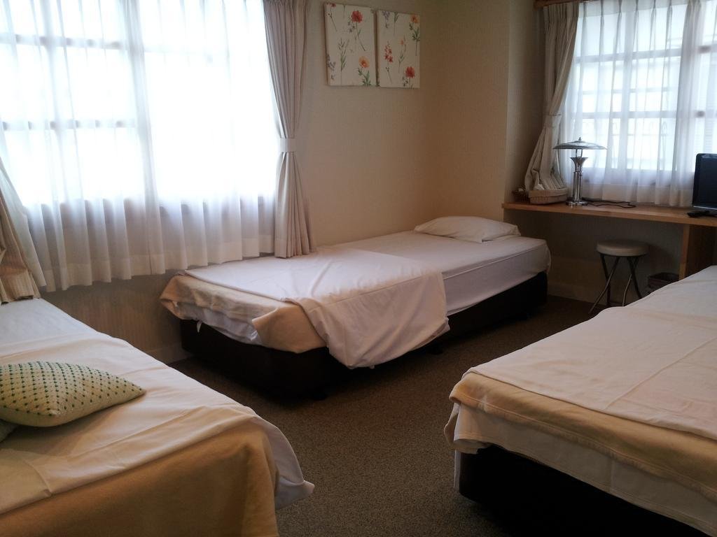 Фото Gamagori Orange Pension