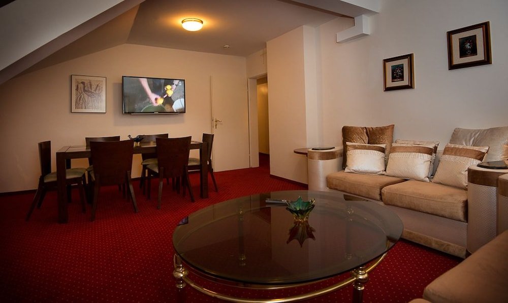 Фото Hotel am Kochbrunnen