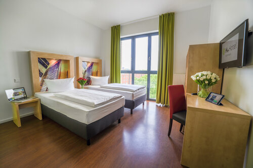 Гостиница H+ Hotel 4 Youth Berlin Mitte в Берлине