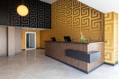 Фото Trip Inn Conference Hotel & Suites