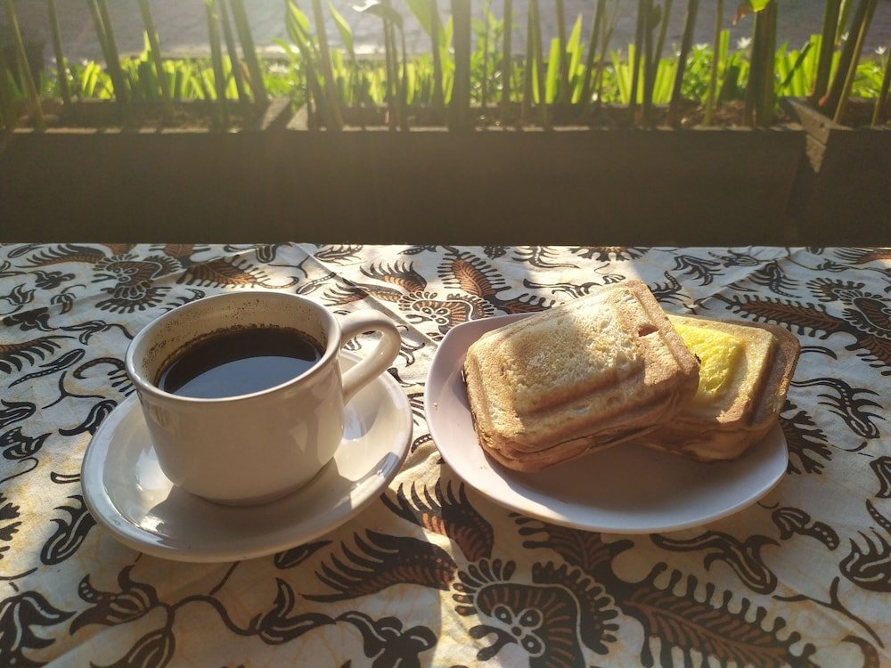 Фото Taman Mekar Beach Inn 2