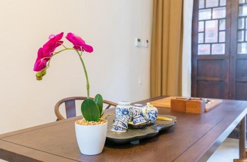 Фото Yi Garden Cultural Hotel Disney Branch