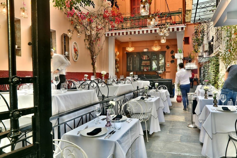 Фото 2 Mazi Suites