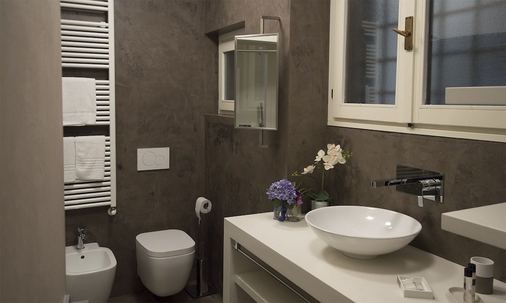 Фото Vicolo Zini Apartments