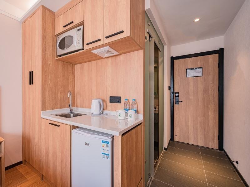 Фото GreenTree Inn Beijing Guangmingqiao Express Apartment