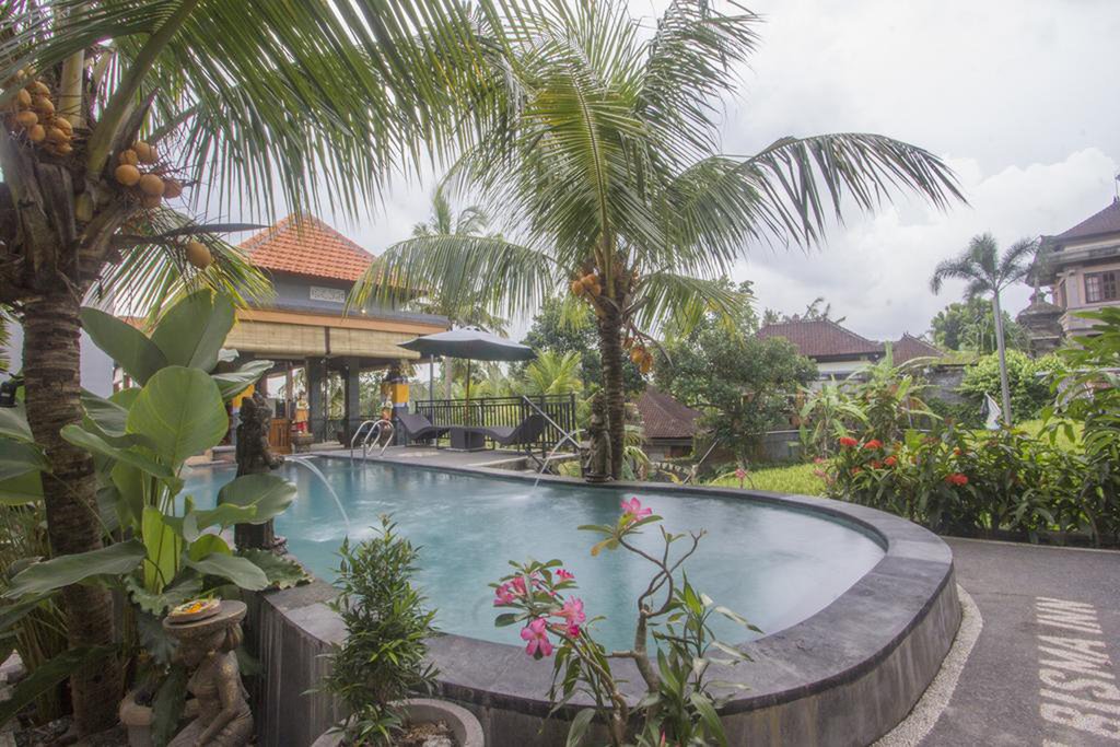 Фото Adi Bisma Inn by Mahaputra