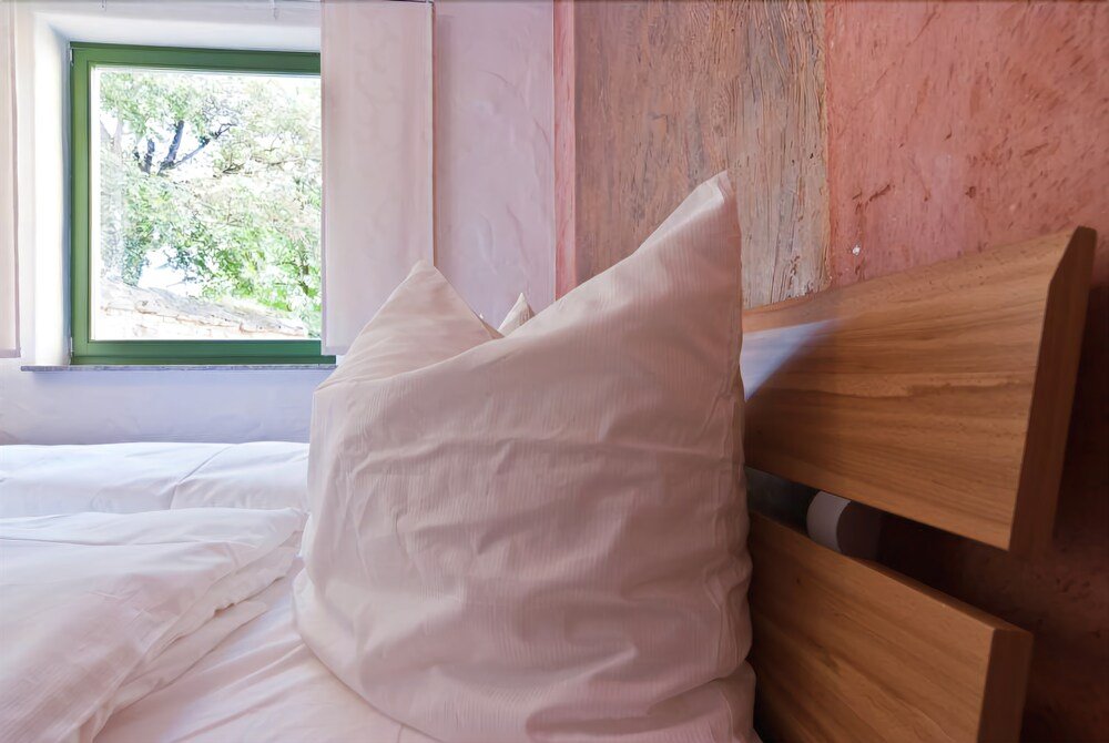 Фото Ferienwohnungen 'Am Butterturm'