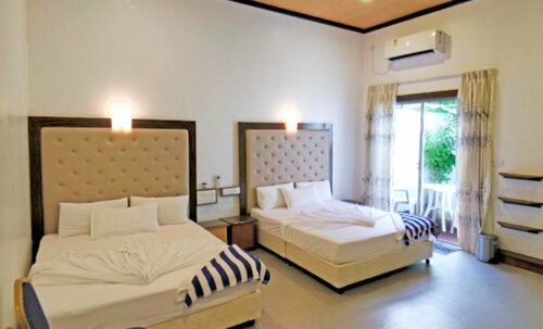 Гостевой дом Thoddoo Inn на Тодду