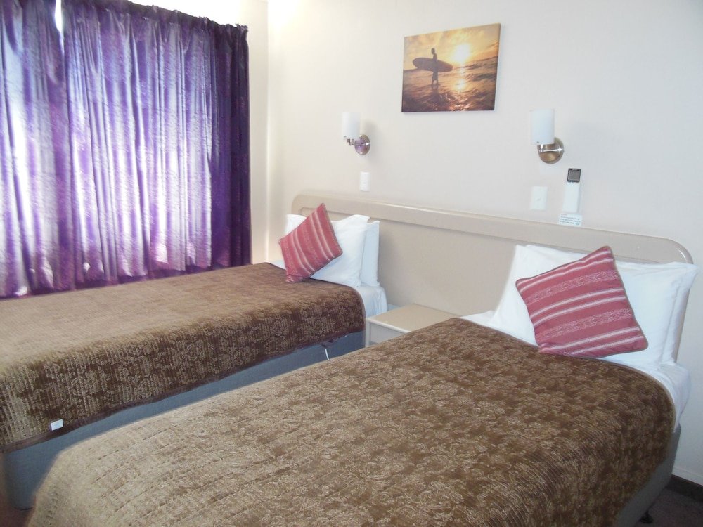 Фото Asure Camelot Arms Motor Lodge