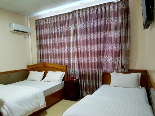 Фото Man Thi Tar Hotel