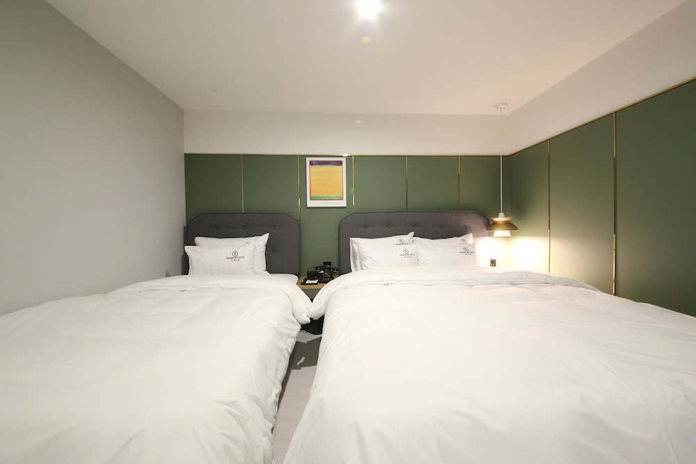 Фото Brown Dot Hotel Minam