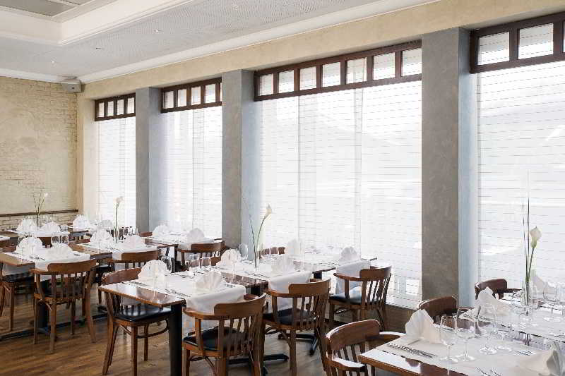 Фото Nh Fribourg Hotel