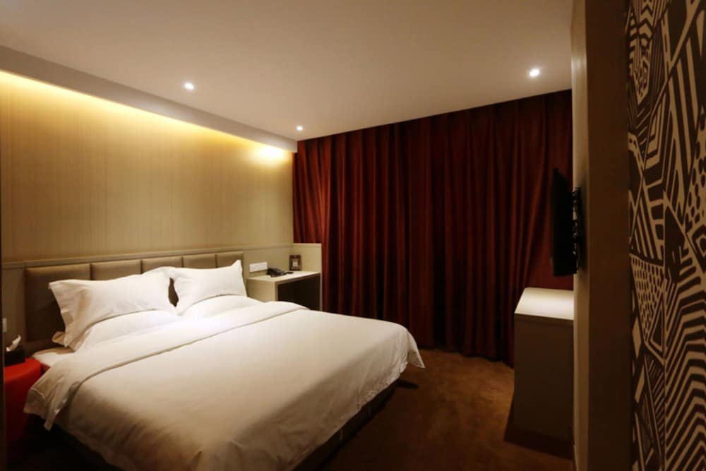 Фото Xinhua Boutique Hotel