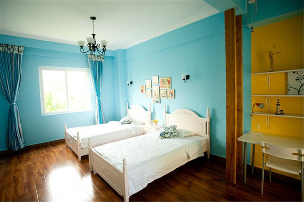 Фото Sanya Homey Hotel