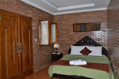 Гостиница Ndalem Suryo Saptono Guest House