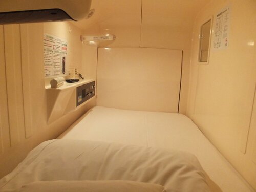 Гостиница Capsule Hotel Wellbe Sakae - Caters to Men в Нагое