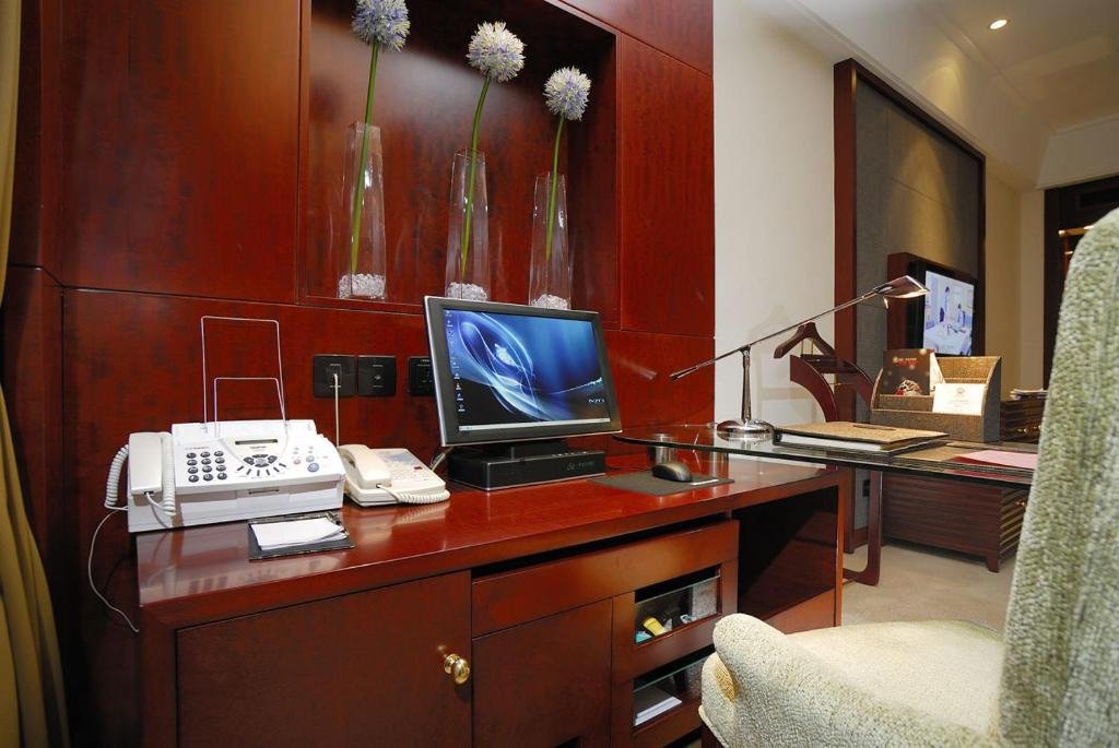 Фото Kunshan Yizui Crown Hotel