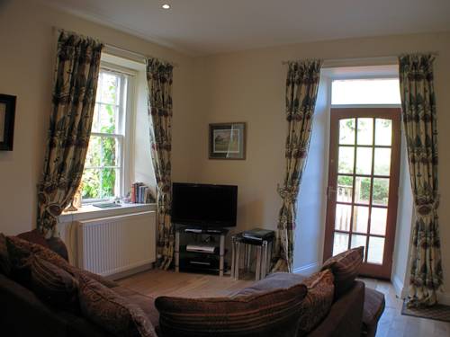 Фото Auchendennan Luxury Self Catering Cottages