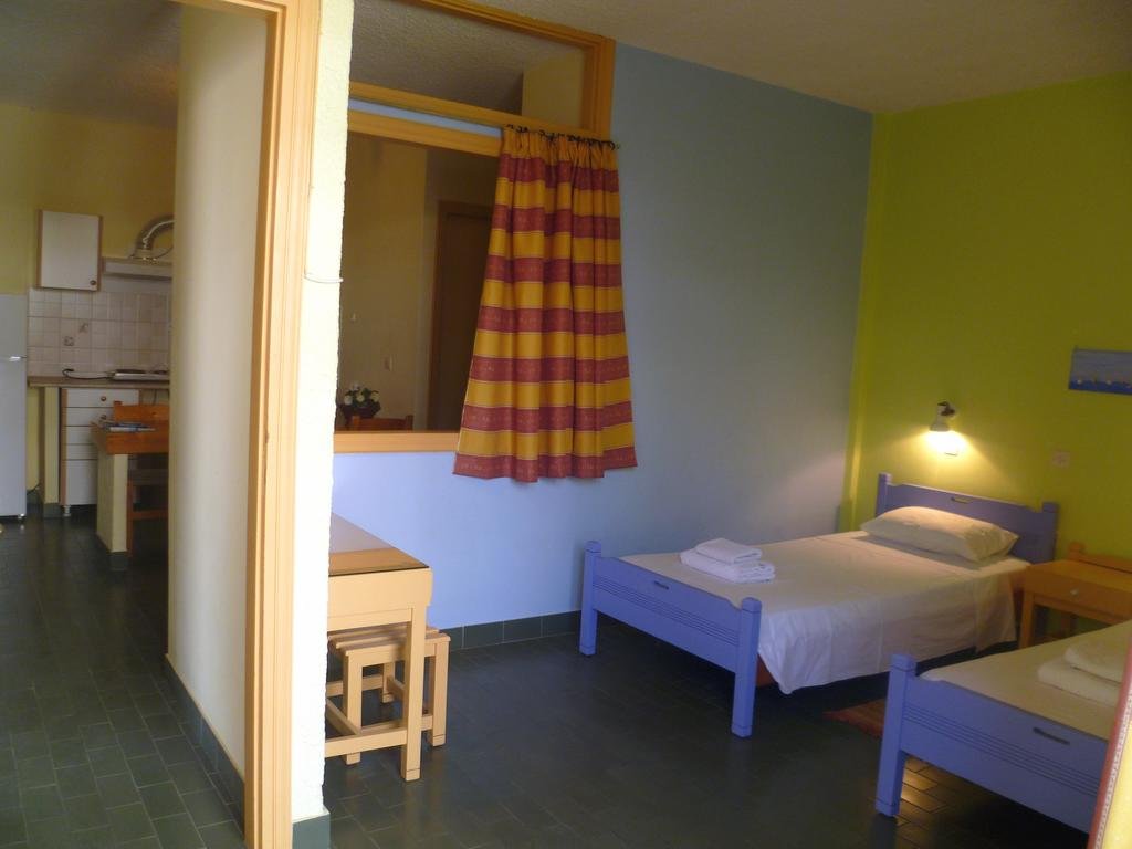 Фото Mamouzelos Hotel Apartments